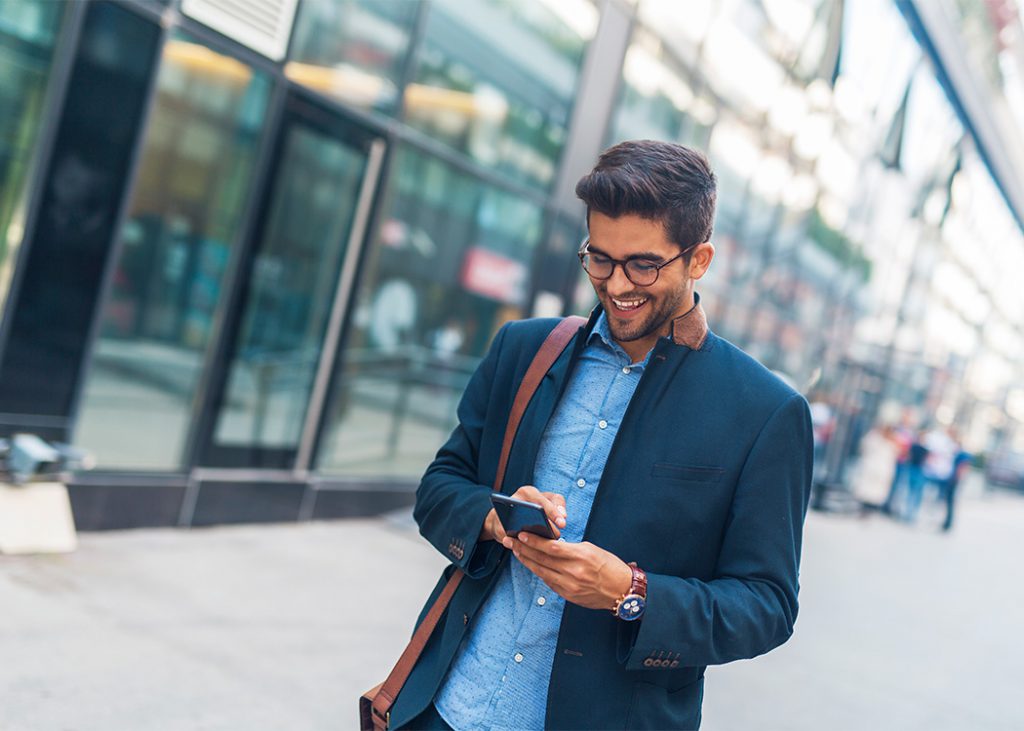 Employee happily texting their chaplain and getting help