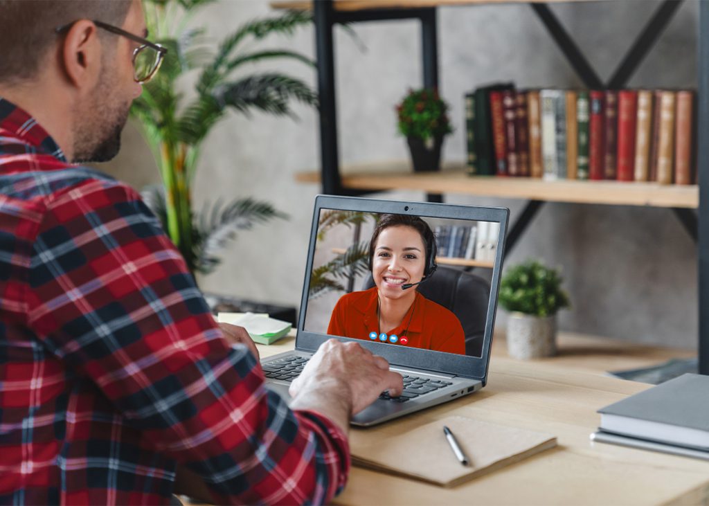 Man on a video call with a TELACHAP Chaplain