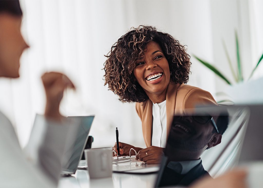 Successful manager who is happy that her employees are supported